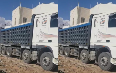 ضبط سائق شاحنة يقل حمولة فائقة في منطقة الخليل